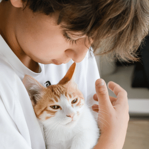 kid with cat in Durham, NC