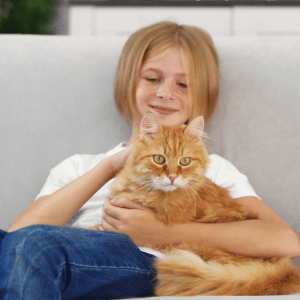 kid with cat in Durham, NC